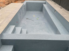 Swimming pool tiling