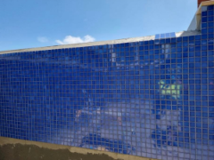 Swimming pool tiling